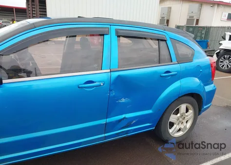 2009 Dodge Caliber Sxt z USA, uszkodzony, nr VIN 1B3HB48A39D186593